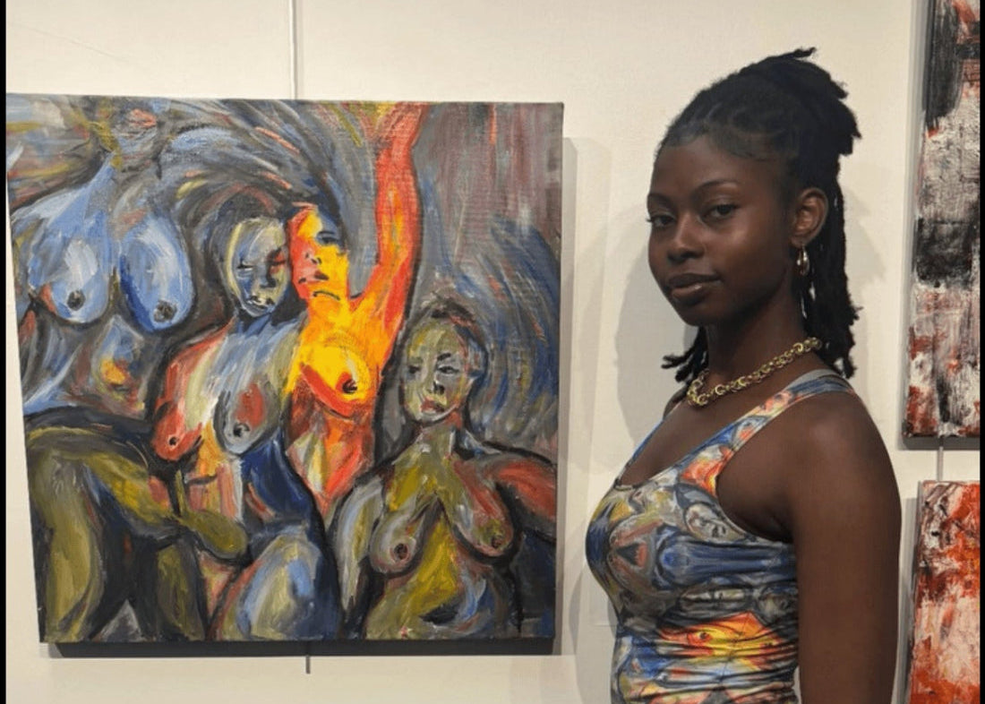 Woman standing next to a painting in an art gallery